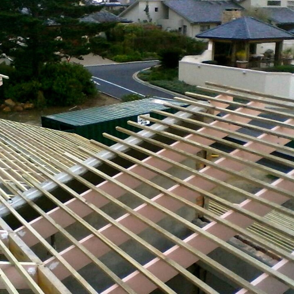 Skilled roofer from 1907 Roofing performing a detailed inspection to ensure top-quality roof installation