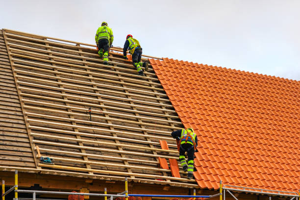 Skilled roofer inspecting flashing, decking, and ventilation before recommending full roof system replacement